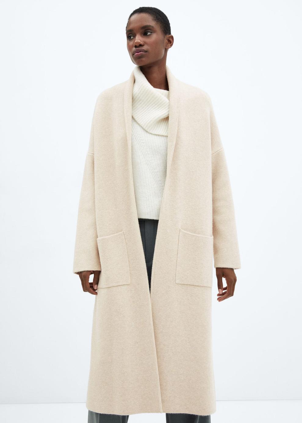 Oversized knitted coat with pockets v akcii za 49,99€ v Mango
